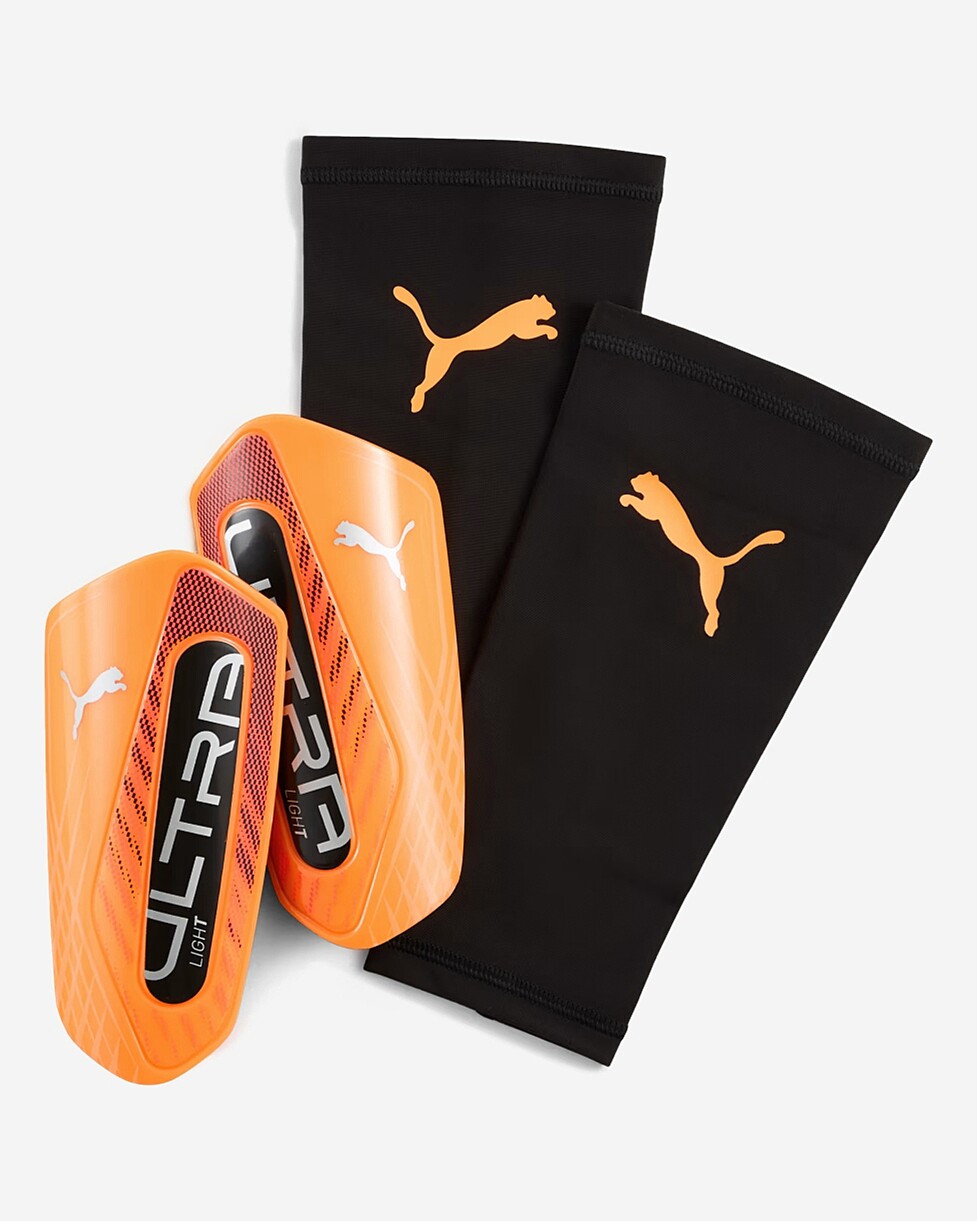 Equipa-te para dominar o relvado com as caneleiras PUMA ULTRA Light com manga! Com uma proteção exterior...  CANELEIRAS PUMA ULTRA LIGHT - LARANJA
