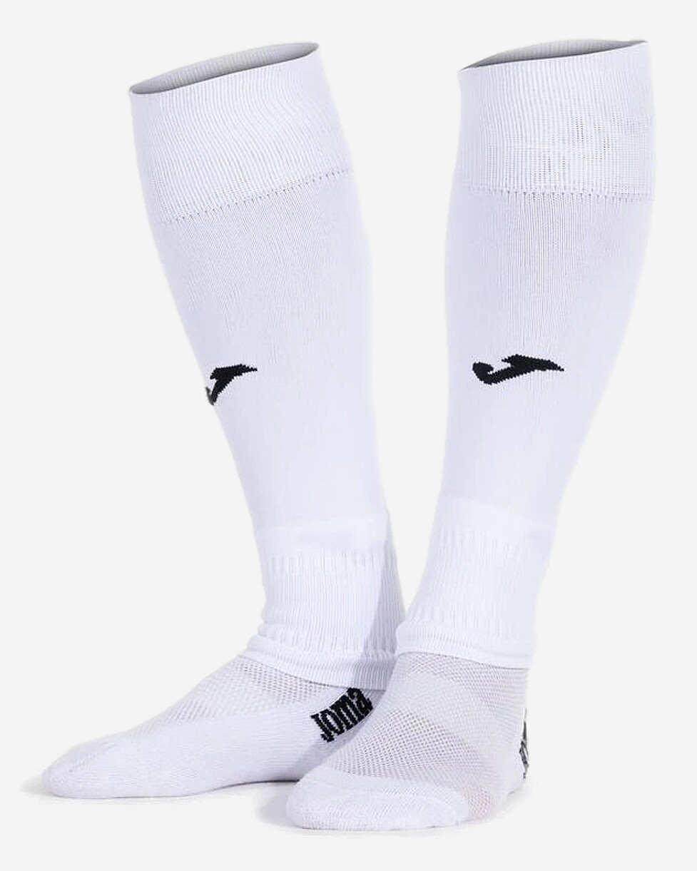 Umas meias pelo joelho que se caracterizam por não terem pé, e que incluem uma tira de elástico para te...  MEIAS JOMA LEG II CALF SIN PIE - BRANCO